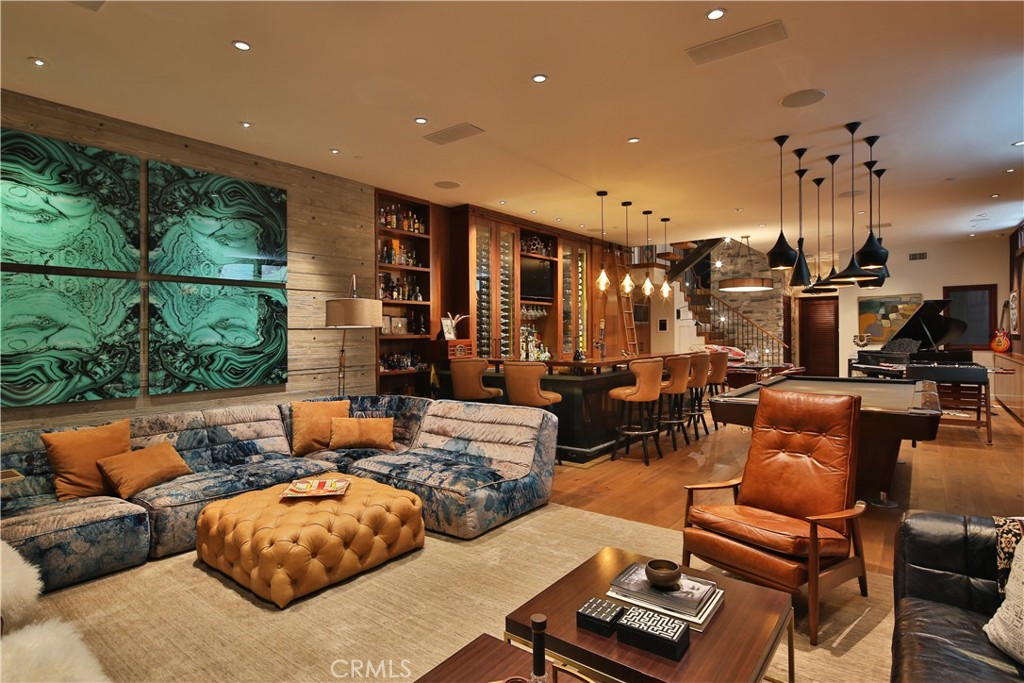 3124 The Strand Hermosa Beach, CA 90254 - Photo 13 of 28 a living room with furniture and a floor to ceiling window