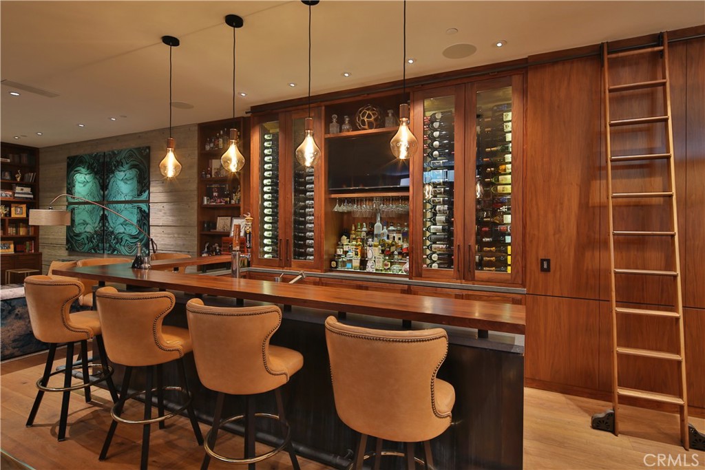 3124 The Strand Hermosa Beach, CA 90254 - Photo 14 of 28 a dining table chairs and a floor to ceiling window