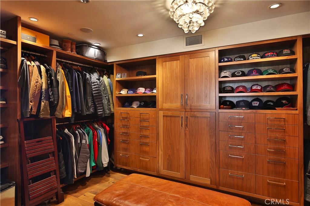 3124 The Strand Hermosa Beach, CA 90254 - Photo 18 of 28 a view of walk in closet with clothes and shoes
