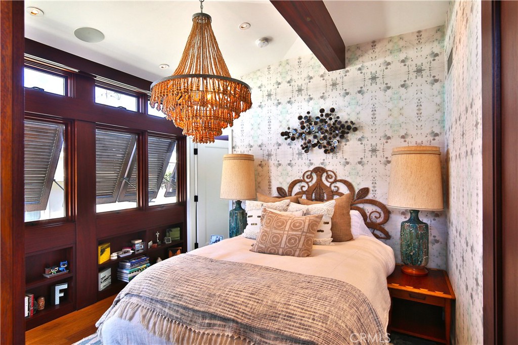 3124 The Strand Hermosa Beach, CA 90254 - Photo 20 of 28 a bedroom with bed and window