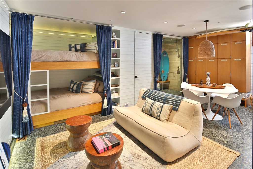 3124 The Strand Hermosa Beach, CA 90254 - Photo 22 of 28 a bedroom with furniture and a large window