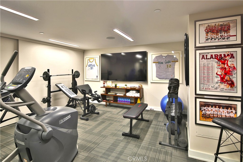 3124 The Strand Hermosa Beach, CA 90254 - Photo 23 of 28 a living room with furniture and a flat screen tv