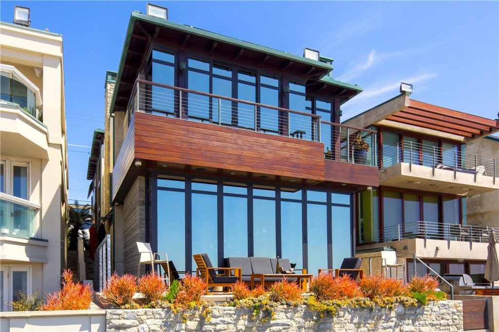 3124 The Strand Hermosa Beach, CA 90254 - Photo 4 of 28 a front view of a building with street view