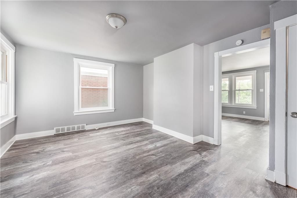 10013 Frankstown Road Pittsburgh, PA 15235 - Photo 10 of 25 Looking for that "open floor plan". You, the buyer can easily move from room to room with ease. The continuous premiere premier planking flooring on the first floor, makes this home easy to clean.