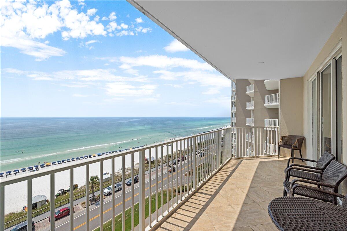 a balcony with view of ocean