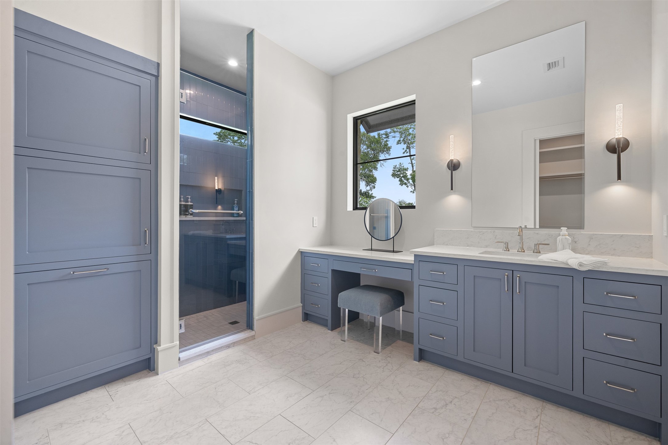 770 South Weyand Road Round Top, TX 78954 - Photo 31 of 50 a bathroom with a sink and a mirror