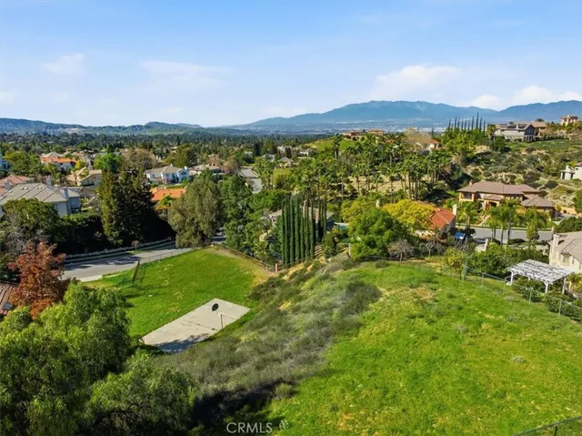 a view of a city with mountains in the background