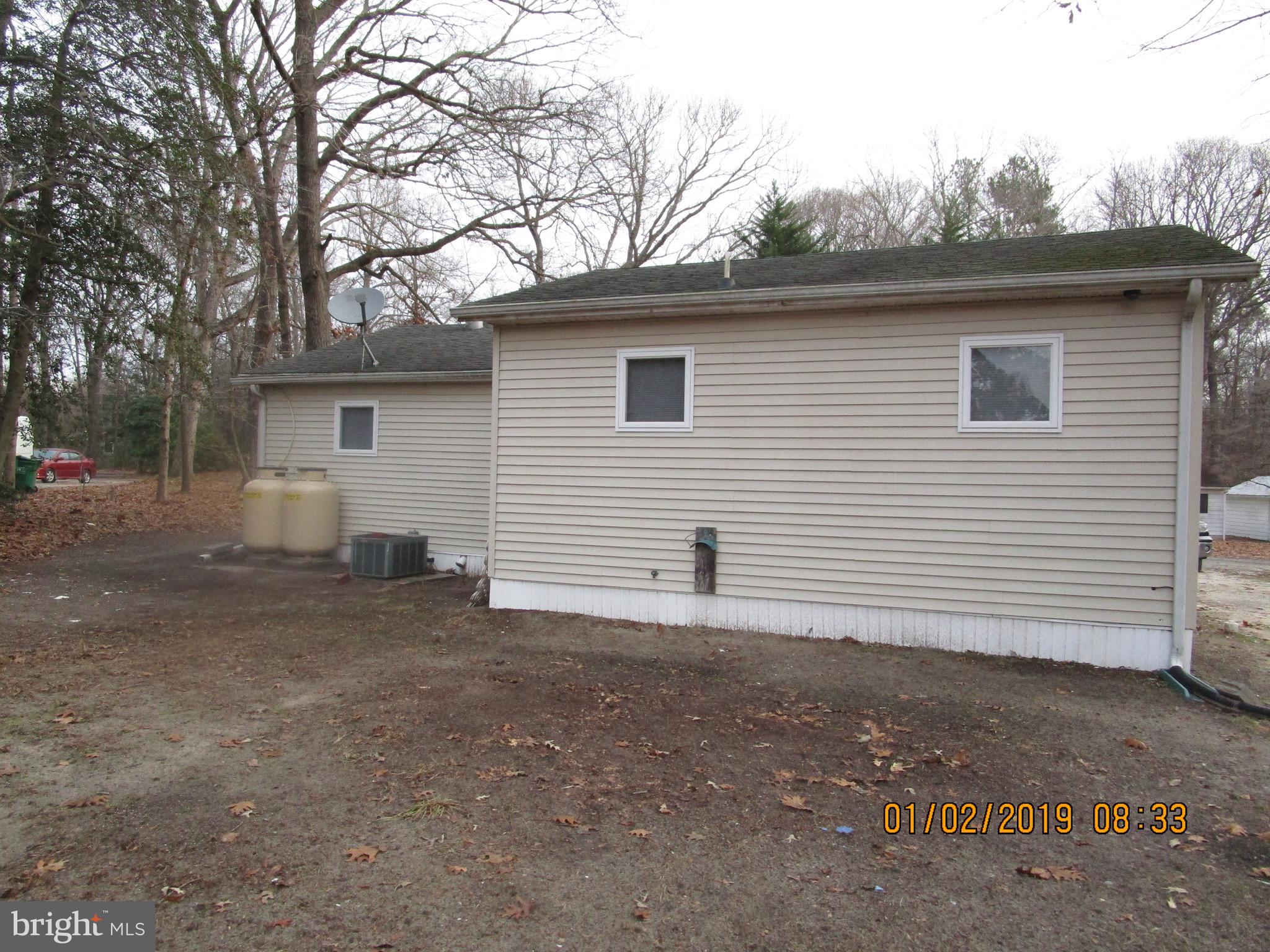 22842 Pine Road Lewes, DE 19958 - Photo 2 of 14 Unit 1 - Rear