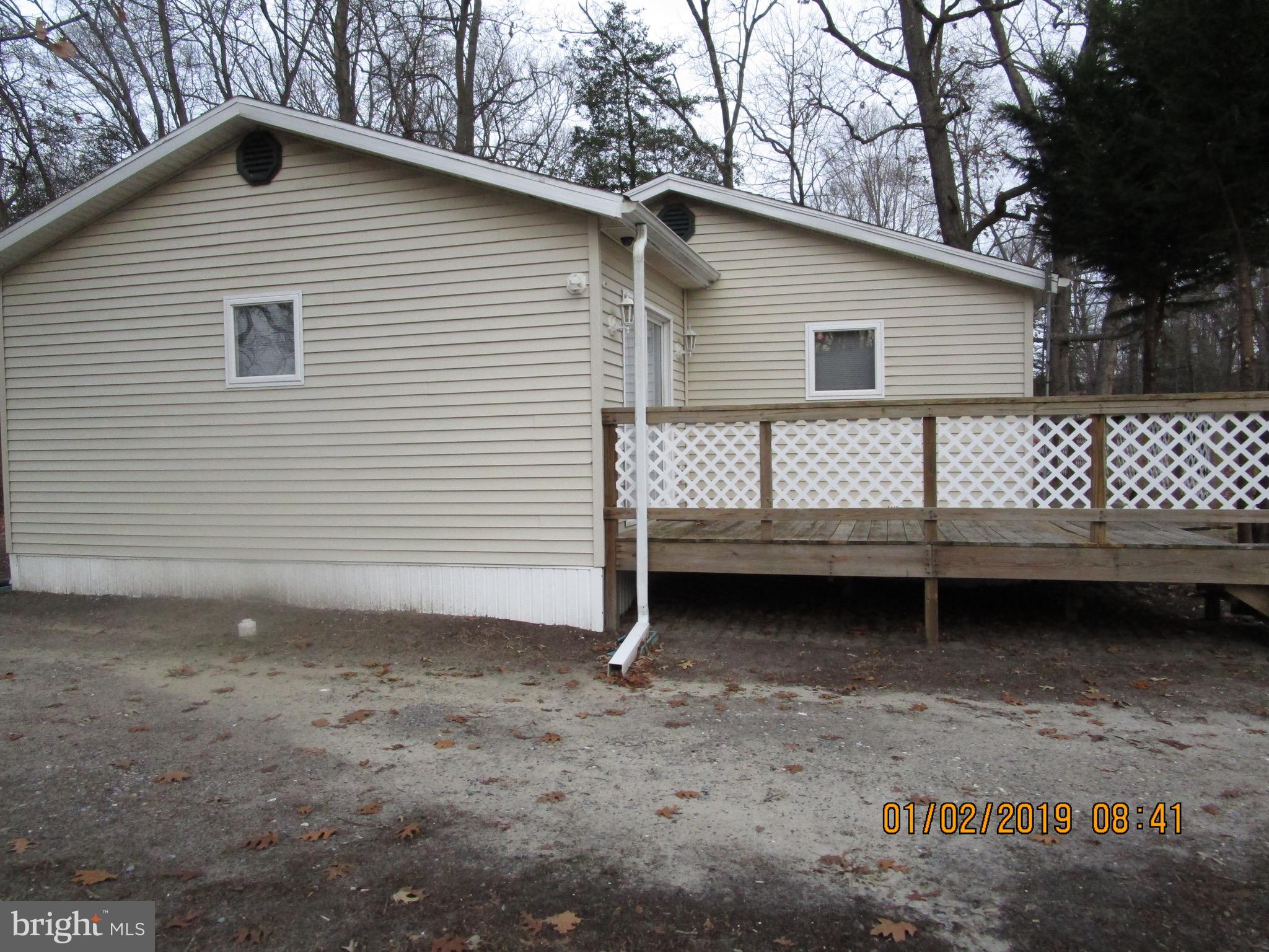 22842 Pine Road Lewes, DE 19958 - Photo 3 of 14 Unit 1 - Left Sideview