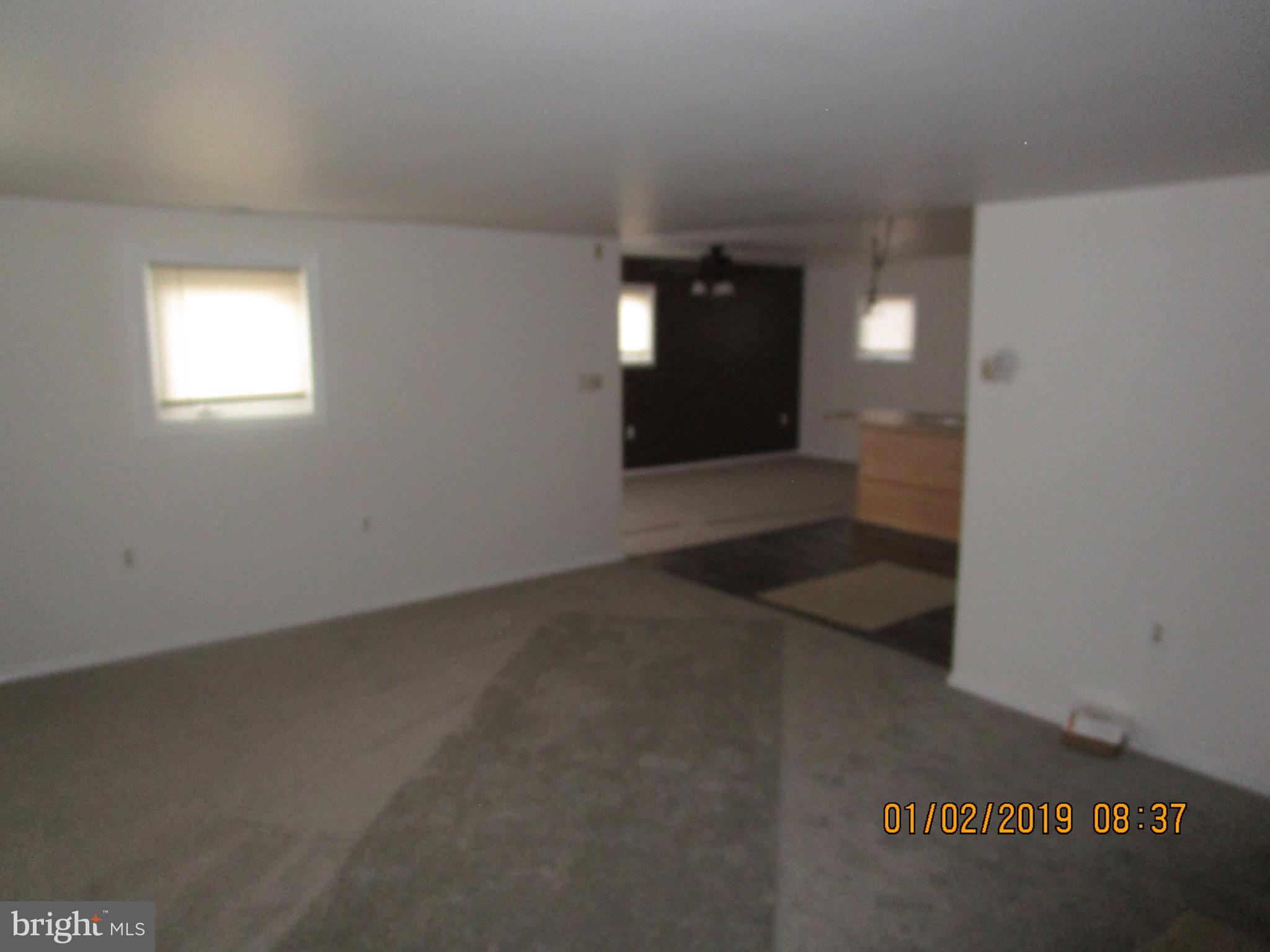 22842 Pine Road Lewes, DE 19958 - Photo 4 of 14 Unit 1 - Living room