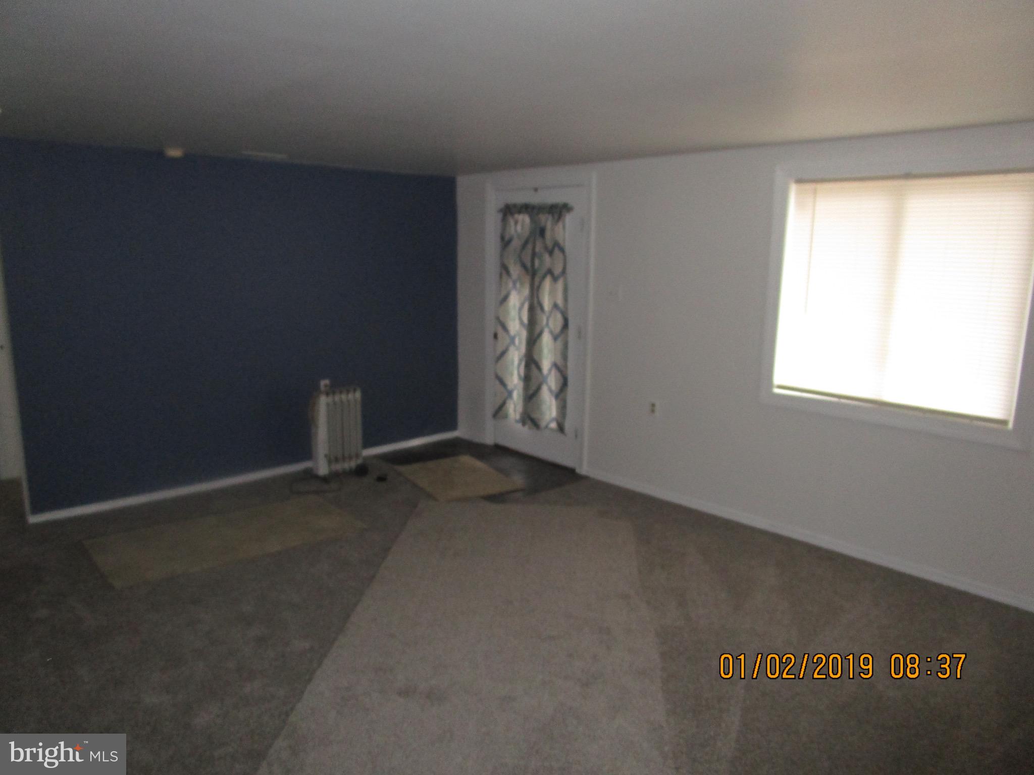 22842 Pine Road Lewes, DE 19958 - Photo 5 of 14 Unit 1 - Living Room View 2