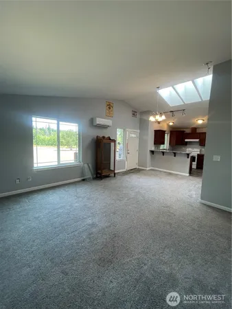a view of a livingroom with a staircase