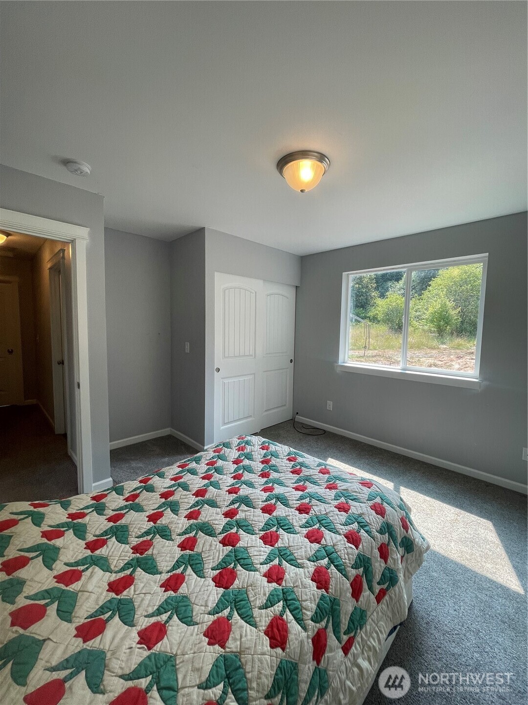 397 Bunker And 0 Bunker Road Chehalis, WA 98532 - Photo 7 of 20 a bedroom with a bed and a window