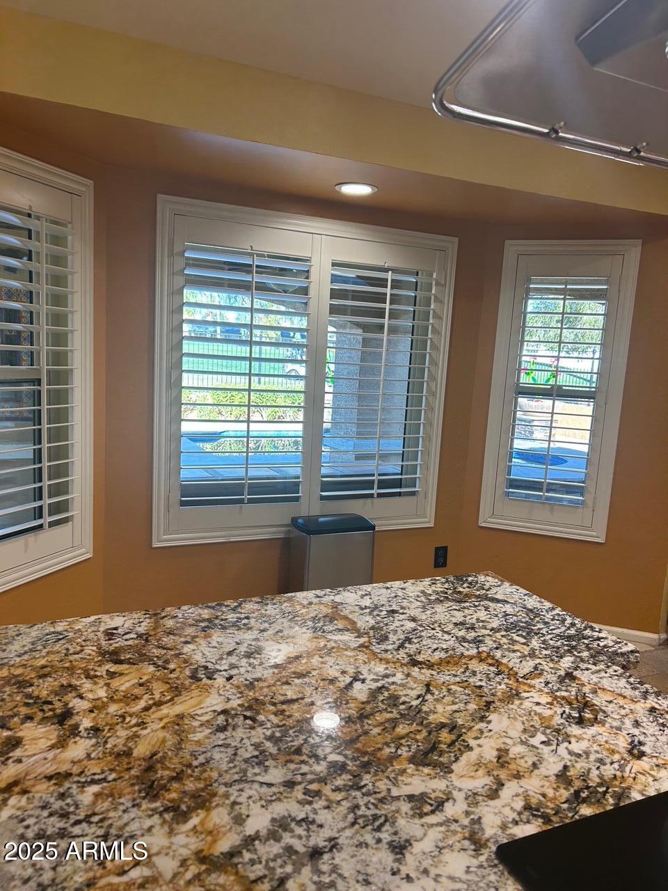 701 South Edgewater Drive Mesa, AZ 85208 - Photo 17 of 41 Showing lots of windows with shutters
