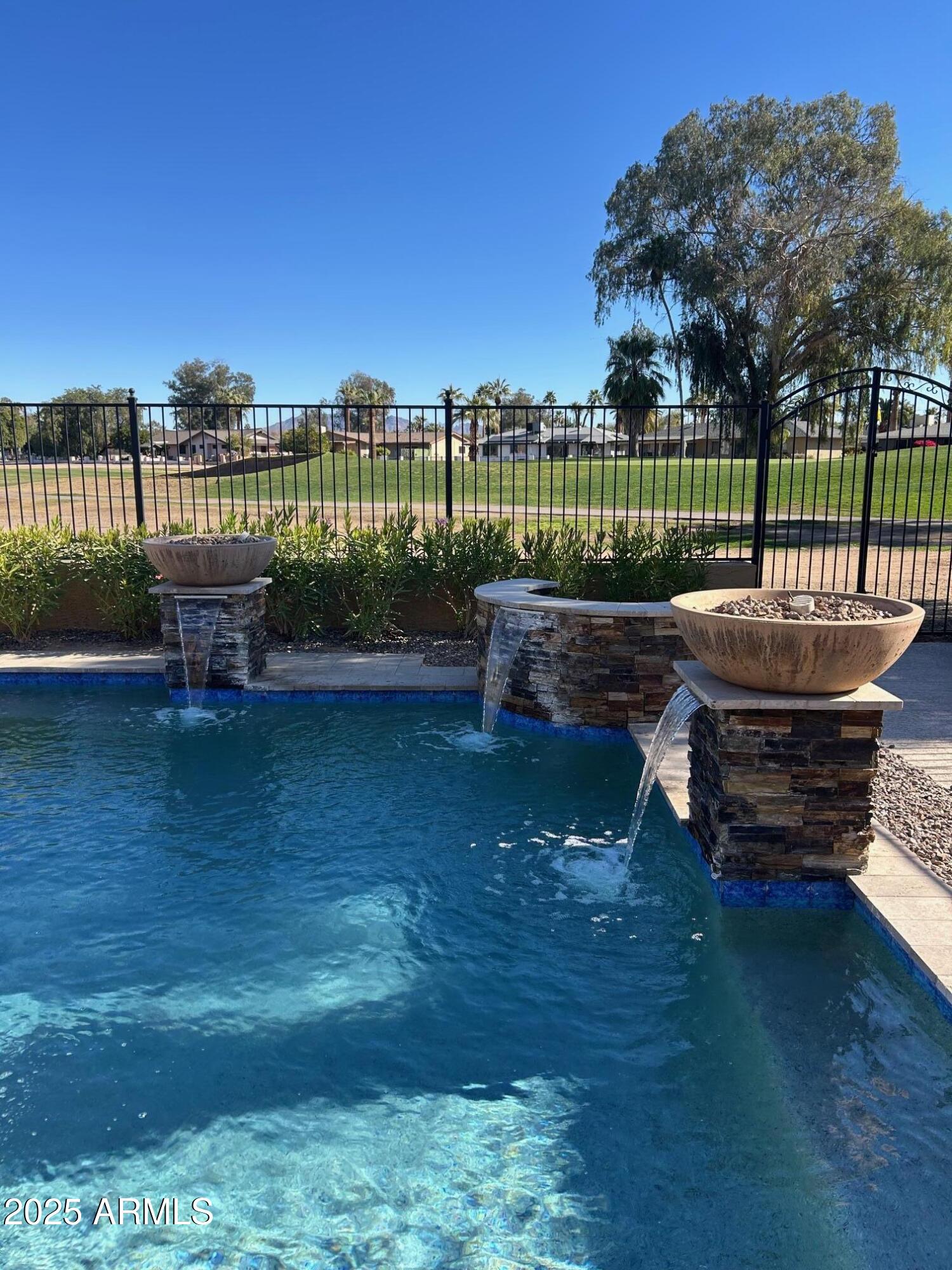 701 South Edgewater Drive Mesa, AZ 85208 - Photo 3 of 41 Pool with waterfall