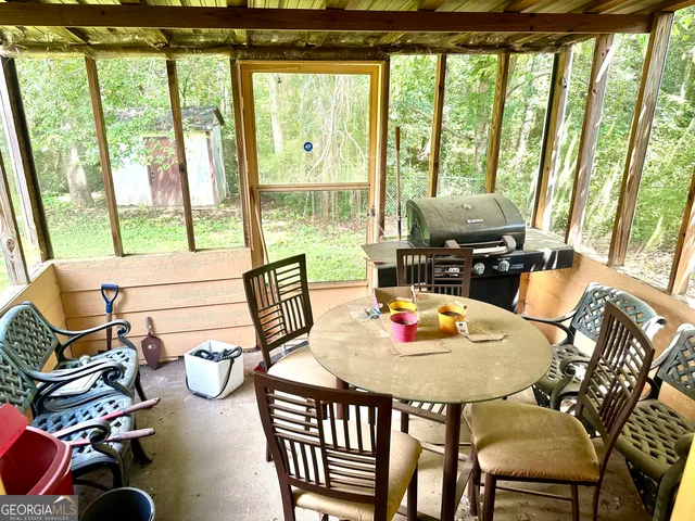a workspace with tables and chairs