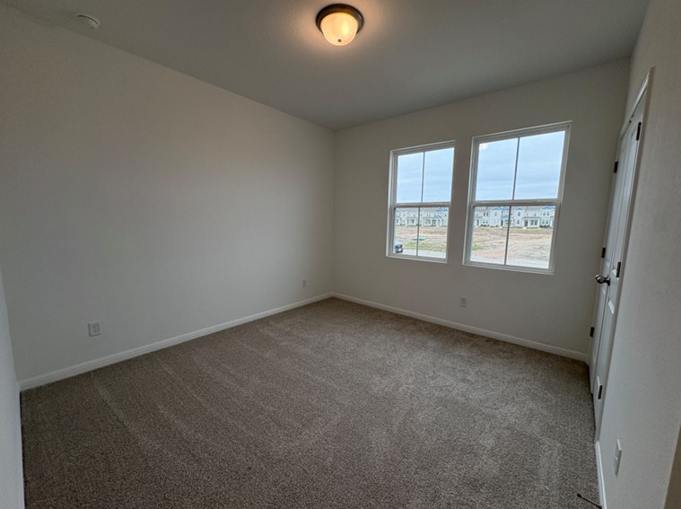 103 Cherry Blossom Lane Taylor, TX 76574 - Photo 13 of 22 Secondary Bedroom