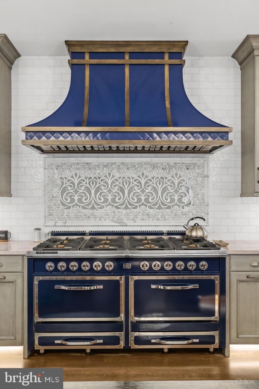 2801 Riverton Road Cinnaminson, NJ 08077 - Photo 12 of 57 a stove top oven sitting inside of a kitchen