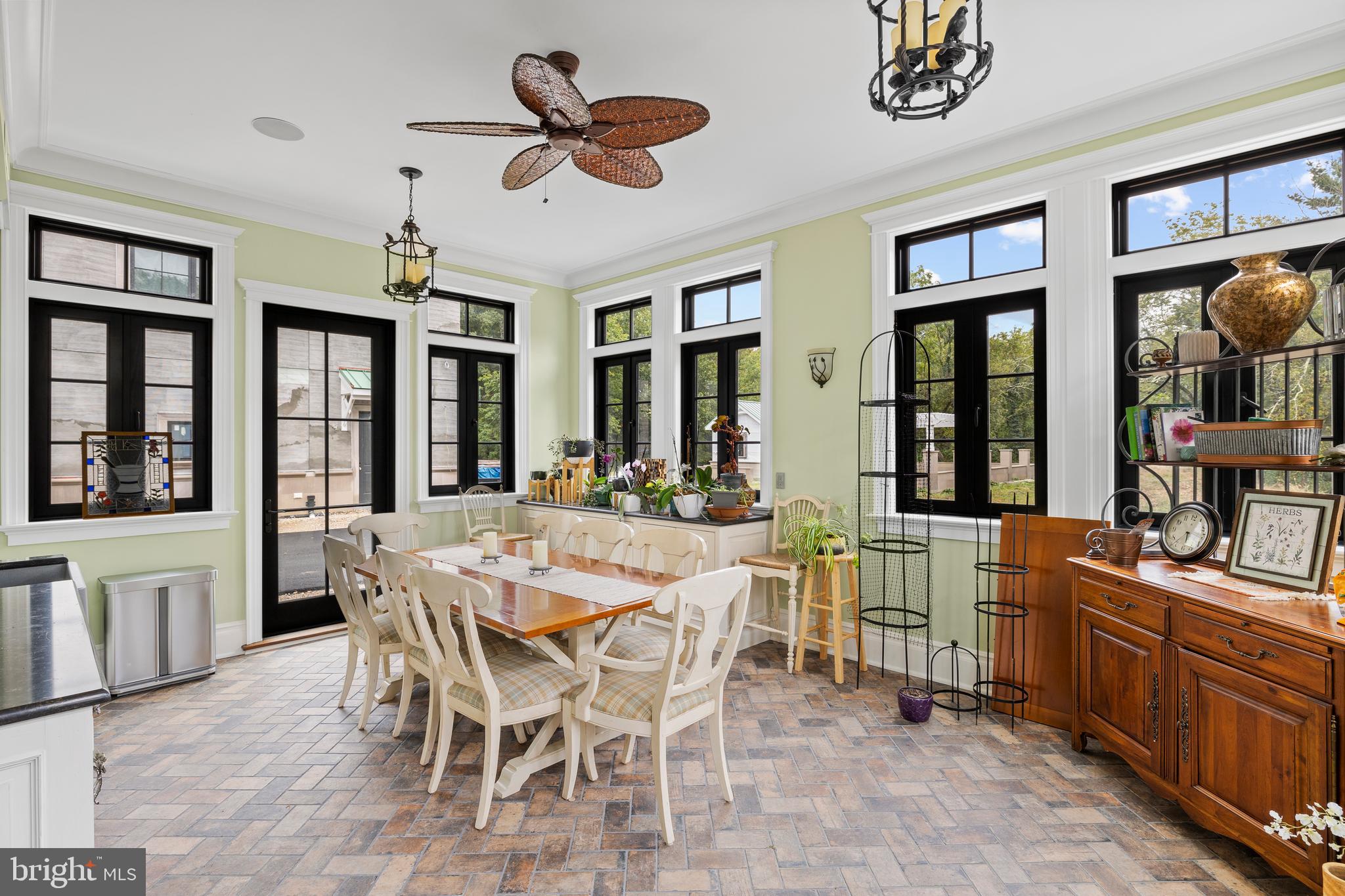 2801 Riverton Road Cinnaminson, NJ 08077 - Photo 26 of 57 a view of a dining room with furniture large windows and ceiling fan