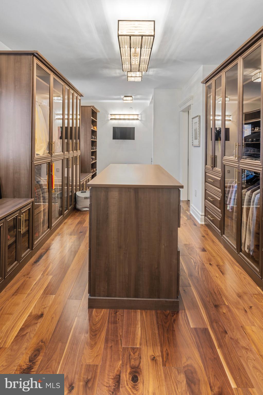 2801 Riverton Road Cinnaminson, NJ 08077 - Photo 37 of 57 a view of a furniture in a hall with wooden floor and a kitchen