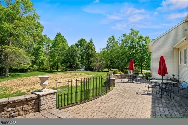 a view of a chairs and tables in the patio