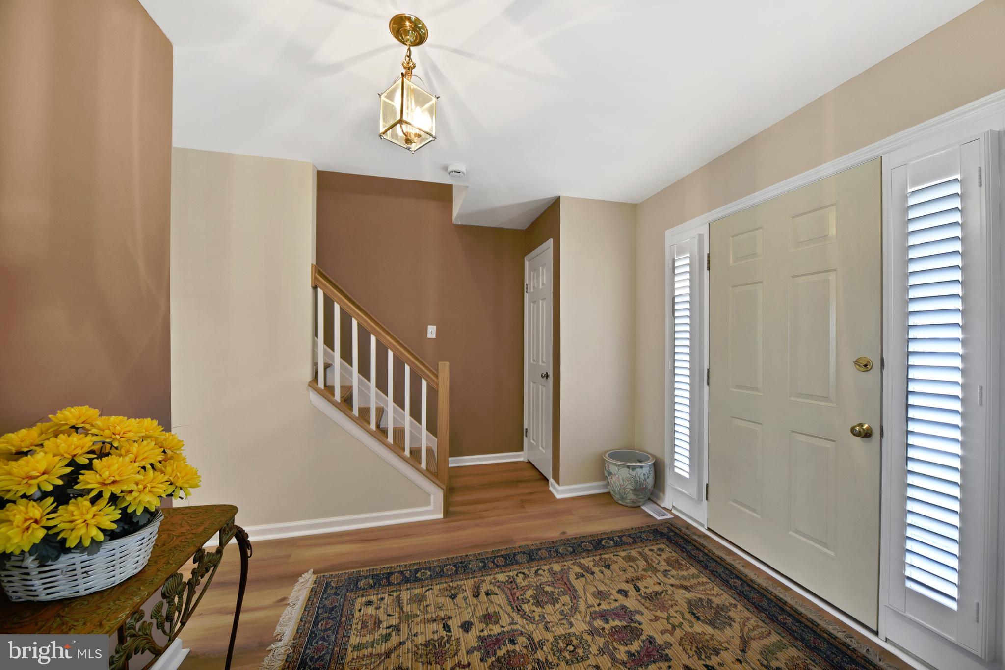 9729 Denrob Court Baltimore, MD 21234 - Photo 4 of 58 a view of entryway with wooden floor