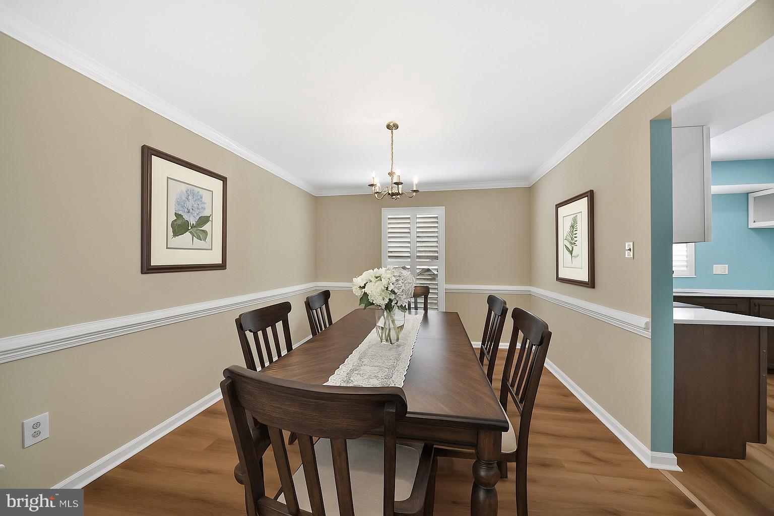 9729 Denrob Court Baltimore, MD 21234 - Photo 10 of 58 a view of a a dining room with furniture window and wooden floor