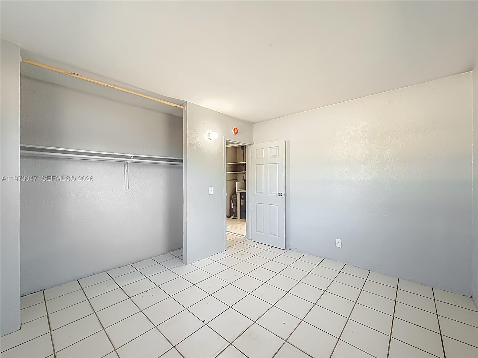 2408 Northwest 8th Street Pompano Beach, FL 33069 - Photo 14 of 24 a view of an empty room