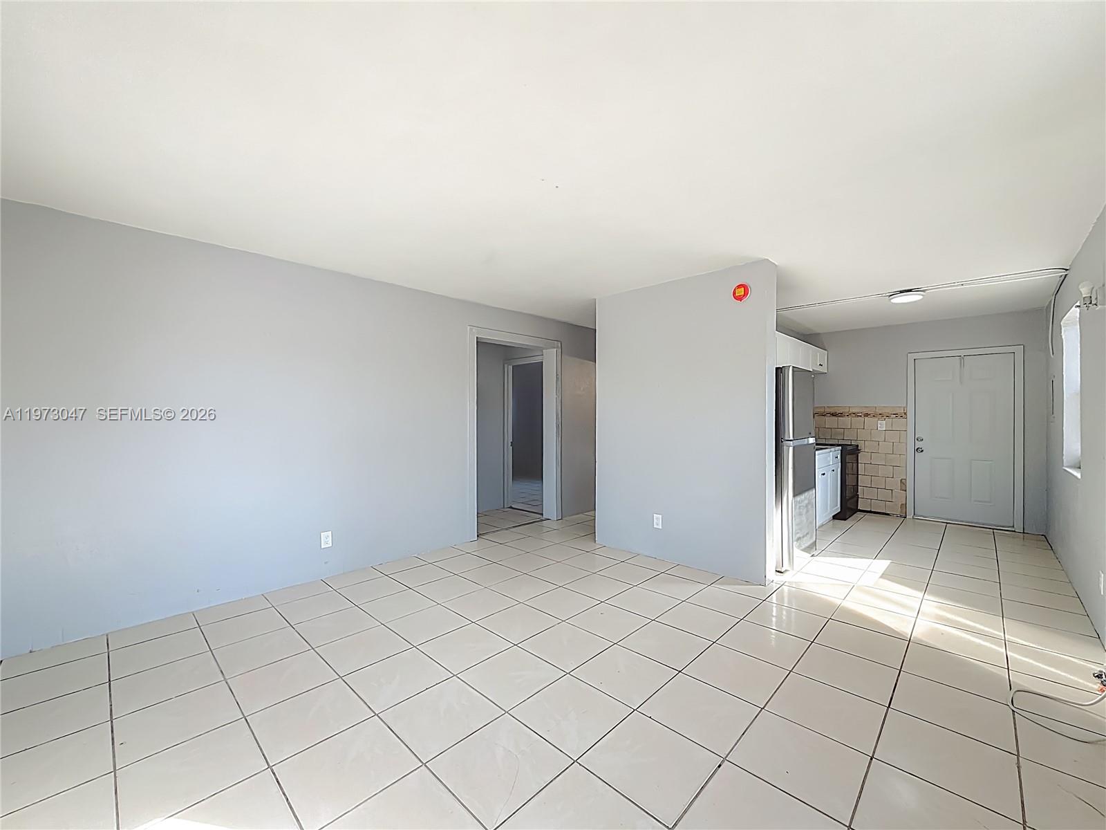 2408 Northwest 8th Street Pompano Beach, FL 33069 - Photo 4 of 24 a view of an empty room