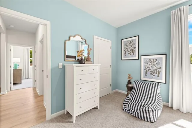 a bathroom with a granite countertop tub sink toilet and mirror