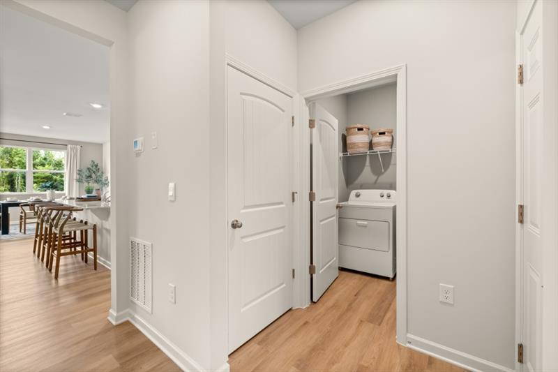 1 Babcock Drive Northeast Rome, GA 30165 - Photo 5 of 51 a view of a hallway with a dining room with wooden floor and electronic appliances