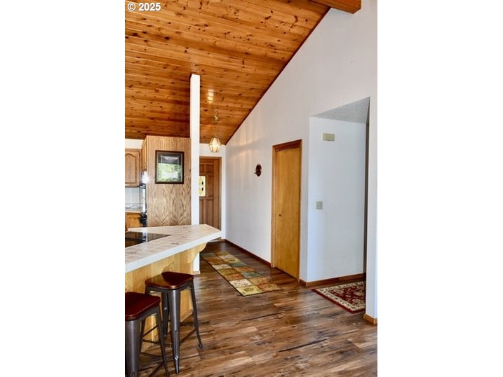 34518 Mutts Way Gold Beach, OR 97444 - Photo 14 of 40 a view of a living room with a table and chairs