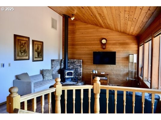 34518 Mutts Way Gold Beach, OR 97444 - Photo 15 of 40 a front view of a house with glass windows