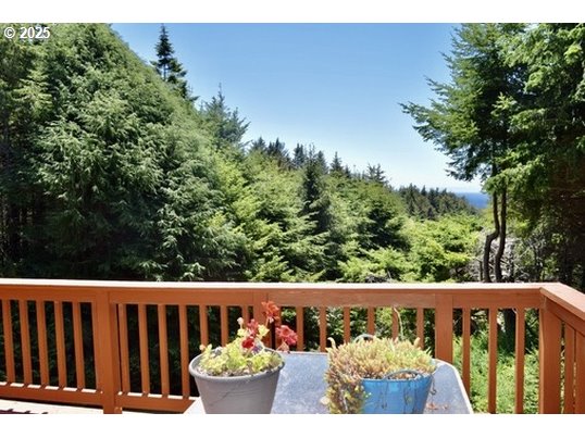 34518 Mutts Way Gold Beach, OR 97444 - Photo 34 of 40 a view of a bench in the balcony