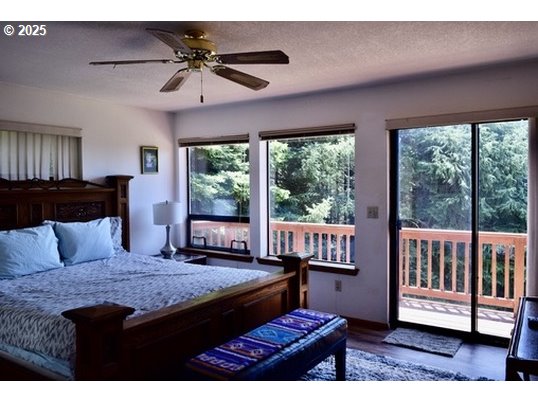 34518 Mutts Way Gold Beach, OR 97444 - Photo 36 of 40 a living room with furniture and a window