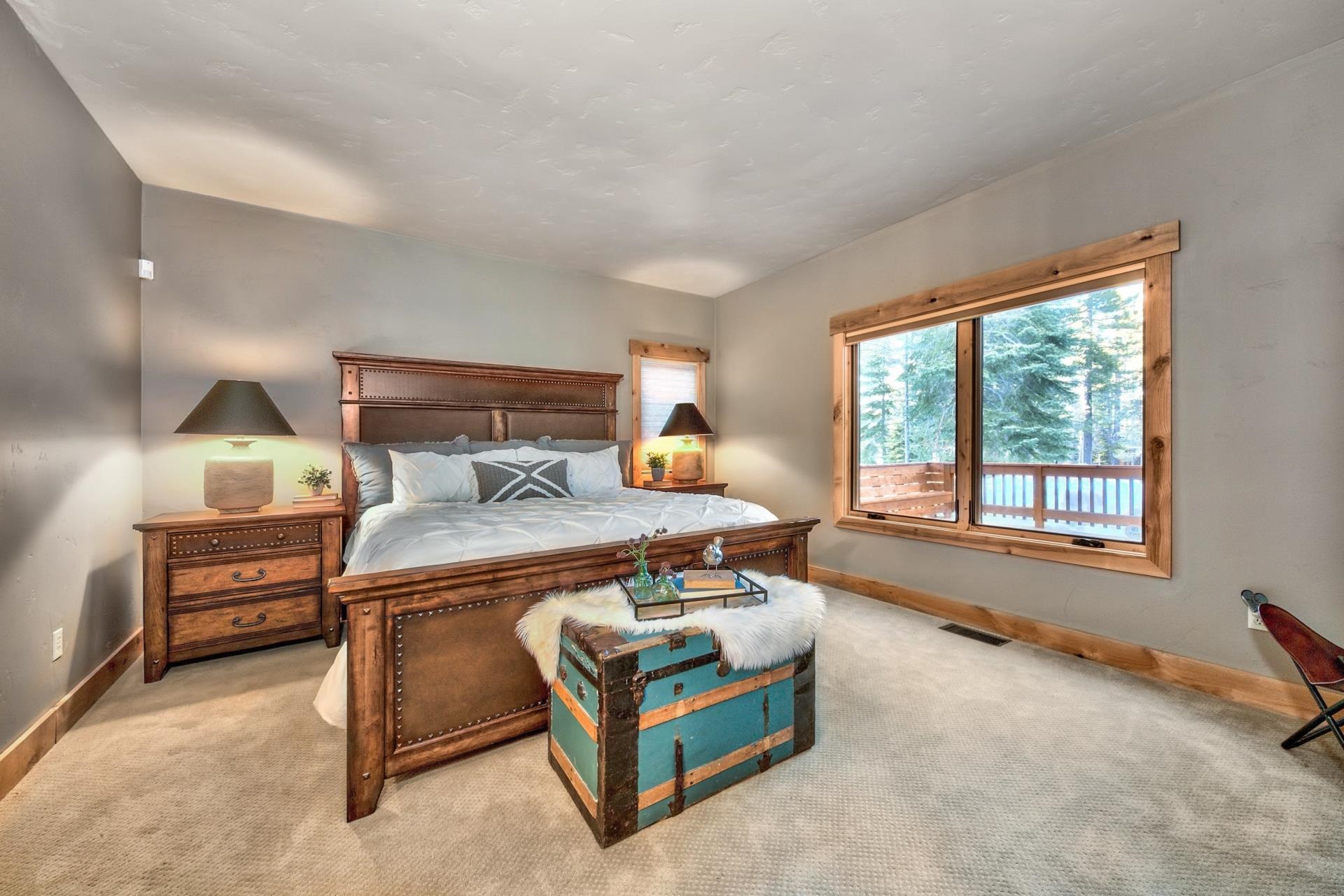 13970 Ski View Loop Truckee, CA 96161 - Photo 13 of 21 a bedroom with a bed and large windows