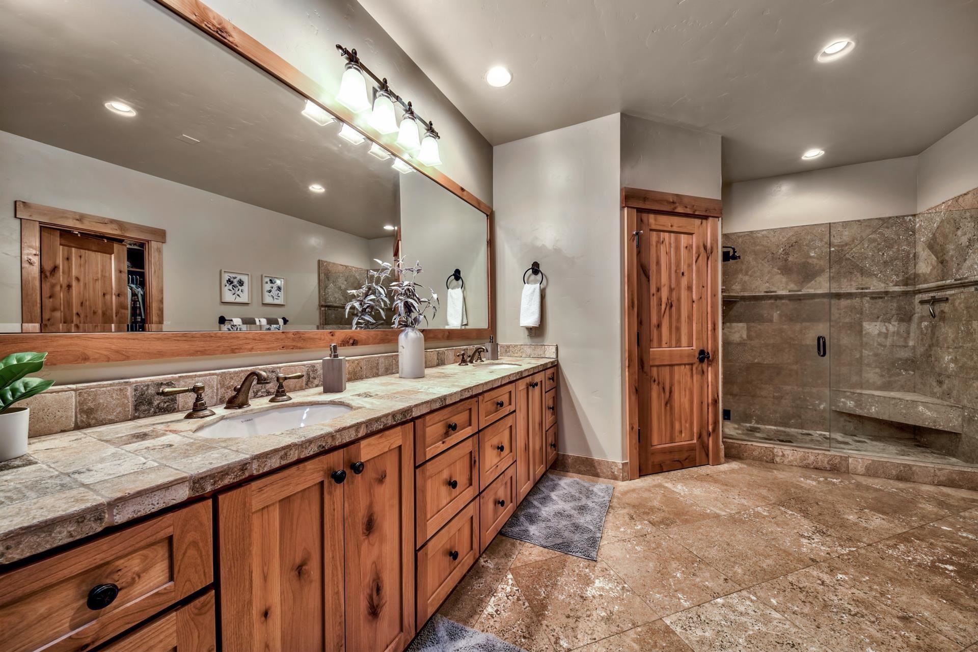 13970 Ski View Loop Truckee, CA 96161 - Photo 14 of 21 a bathroom with double vanity and a shower