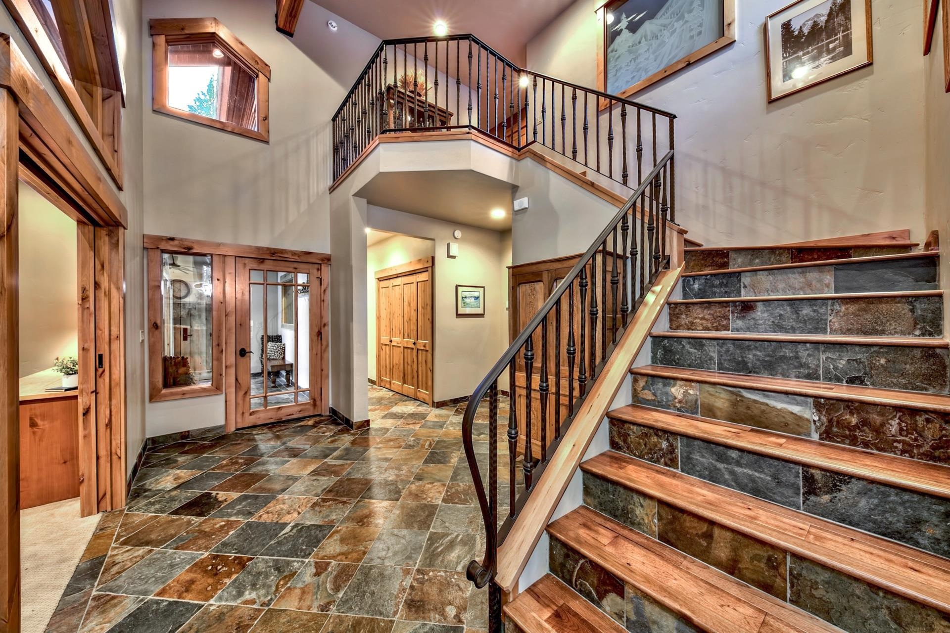 13970 Ski View Loop Truckee, CA 96161 - Photo 15 of 21 a view of staircase with lots of frames on wall and a window