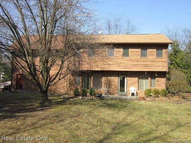 8951 River Valley Road Brighton, MI 48116 - Photo 2 of 25 back of home.JPG