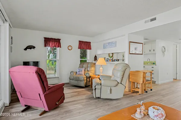 a living room with furniture and a couch