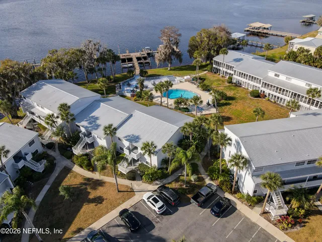 an aerial view of a houses with outdoor space