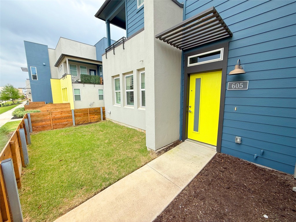 a view of outdoor space and front view of a house