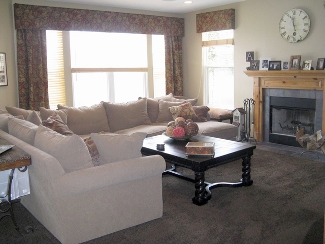 32 Prall's Loop Highwood, IL 60040 - Photo 2 of 10 a living room with furniture and a fireplace