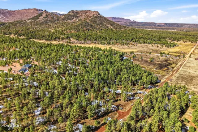 a view of a balcony with chairs