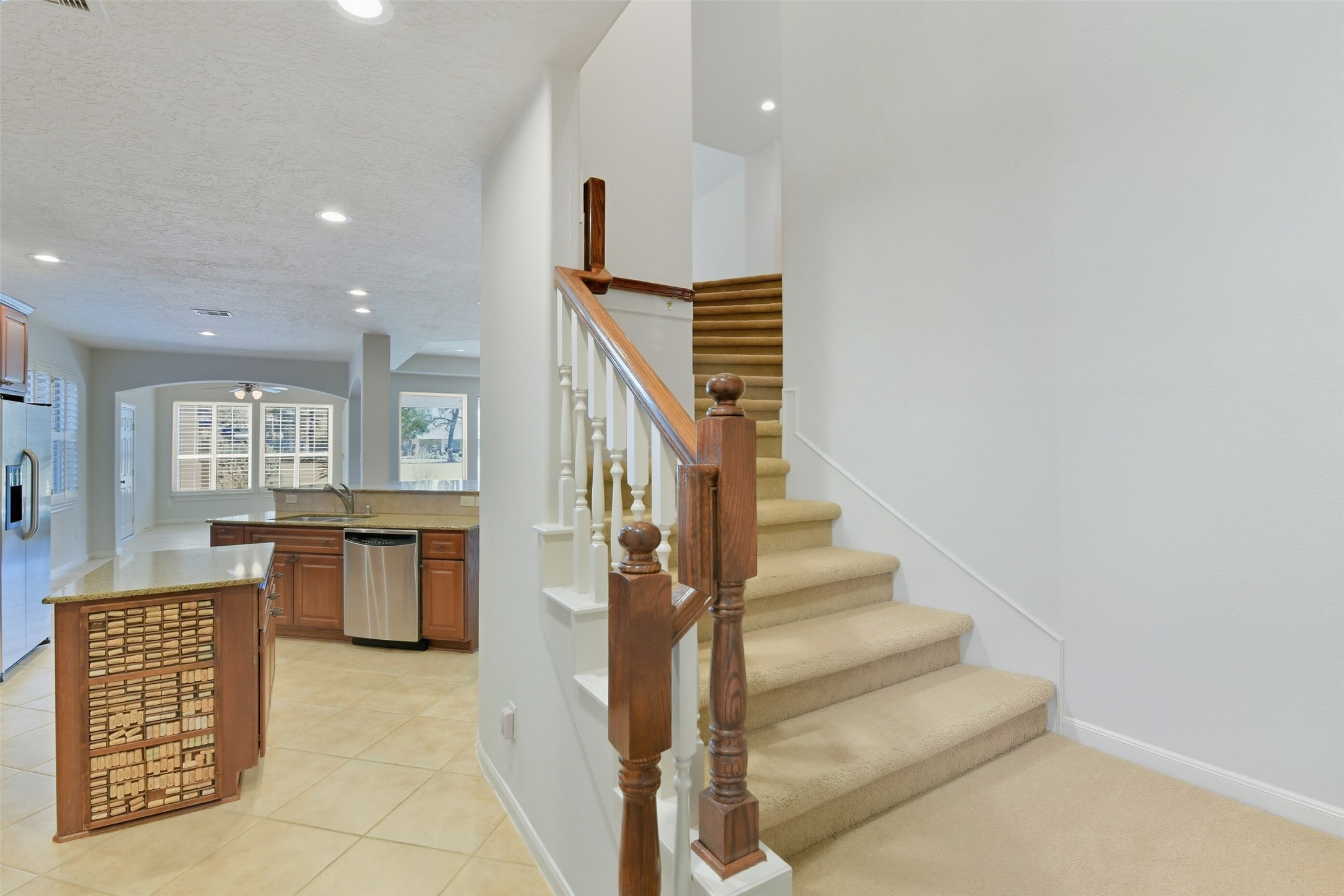 25295 Bull Ridge Drive Porter, TX 77365 - Photo 22 of 49 second staircase off the kitchen near the laundy room- another custom feature in this luxury home.