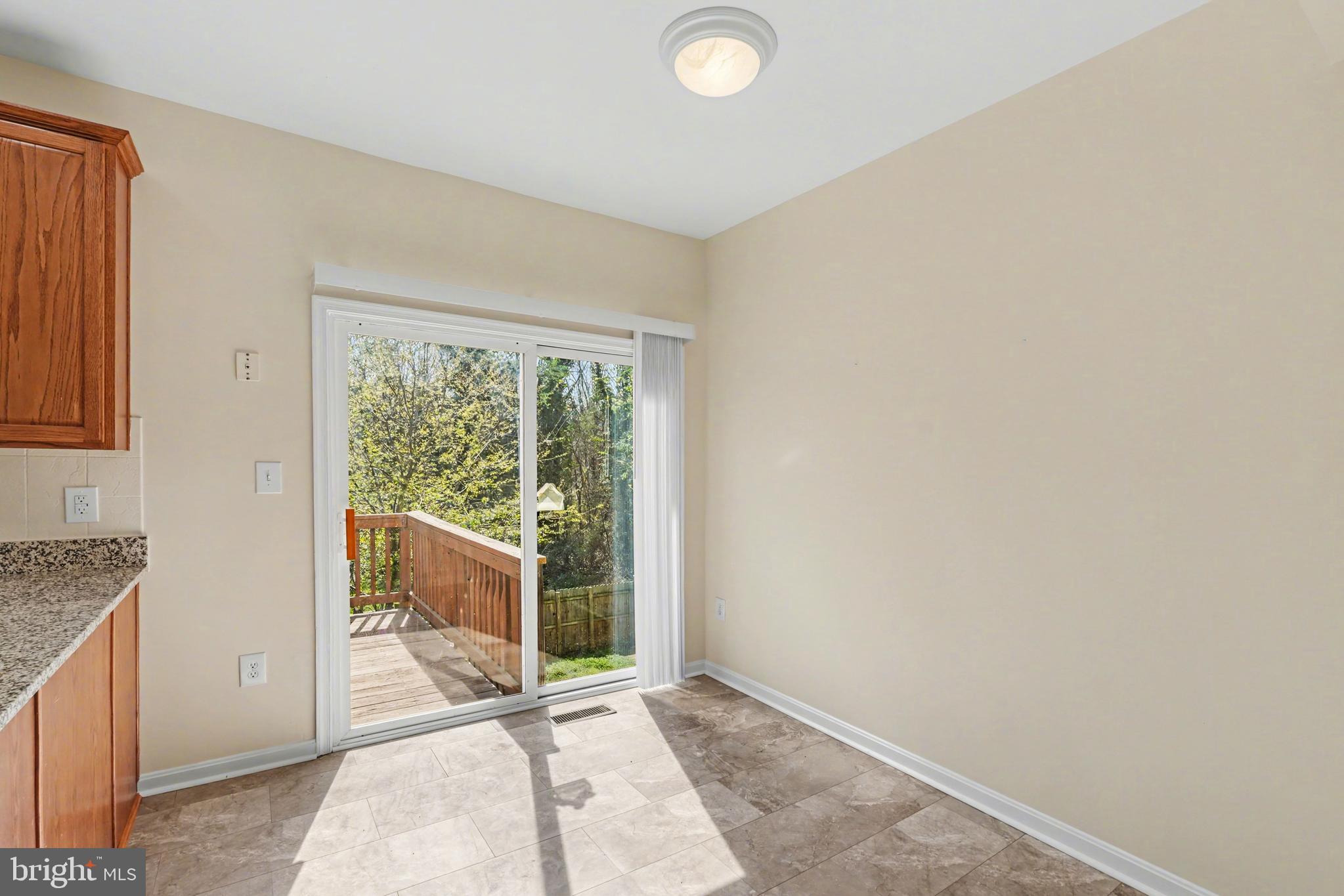 359 Snyder Lane Culpeper, VA 22701 - Photo 11 of 34 Sliding Door to Deck/Dining Area