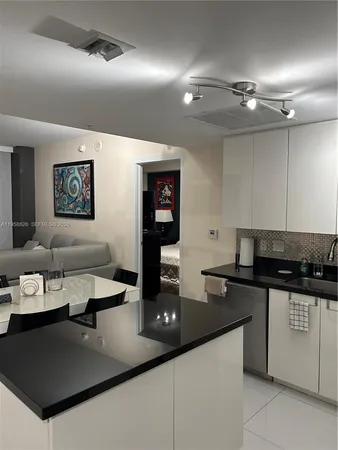 a view of a livingroom with furniture and window