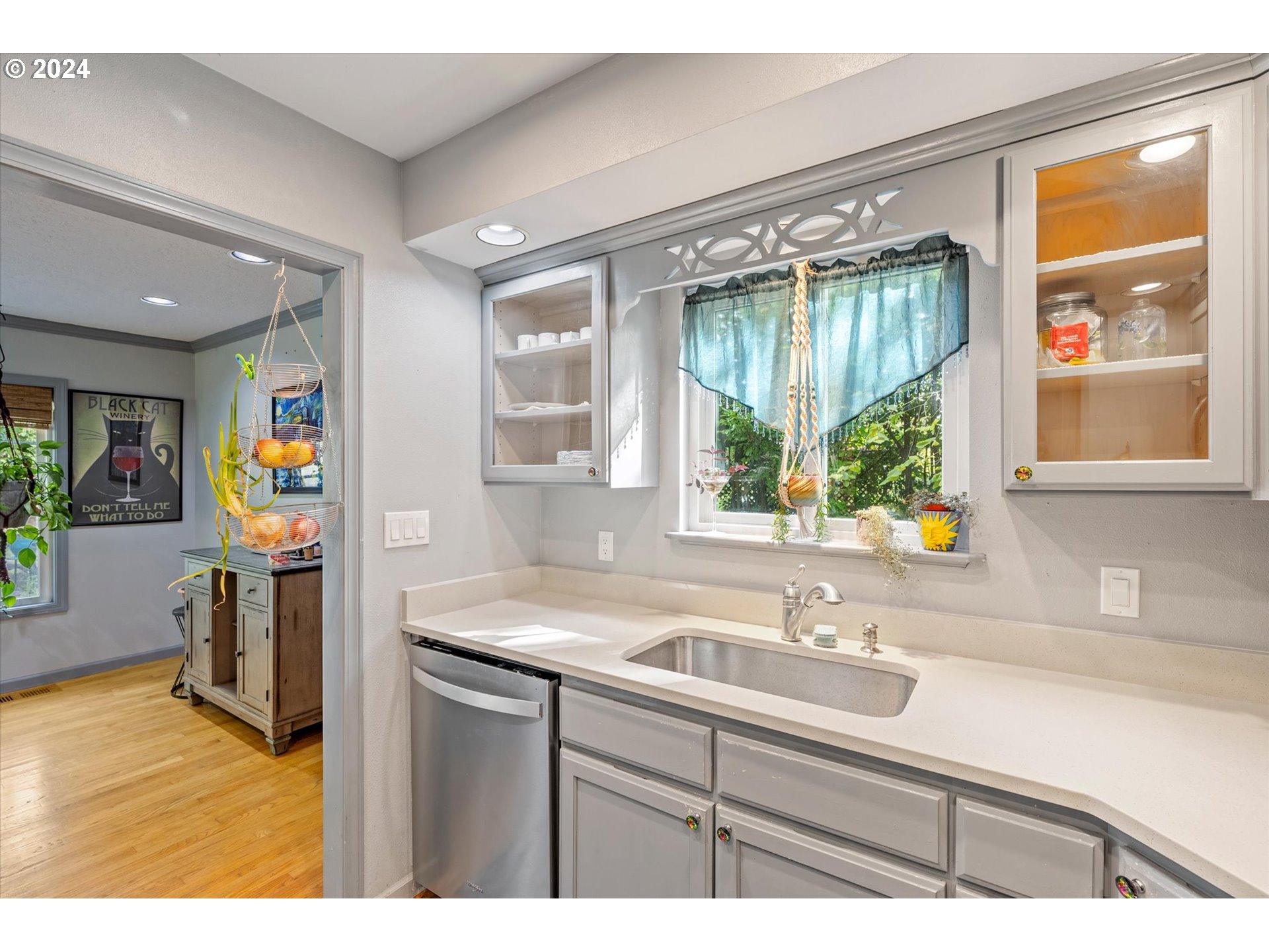 3516 Sunset Way Longview, WA 98632 - Photo 16 of 37 a bathroom with a sink and a large mirror