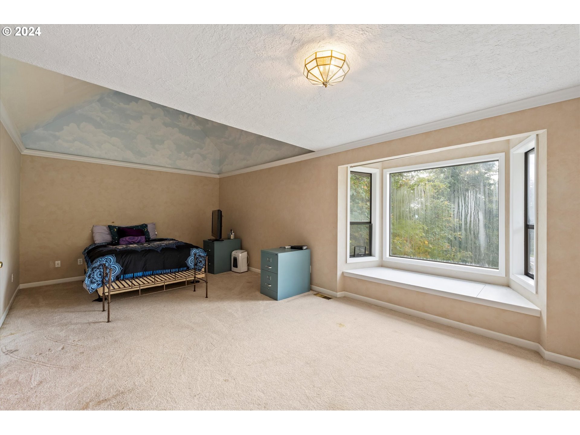 3516 Sunset Way Longview, WA 98632 - Photo 19 of 37 a bedroom with furniture and a window