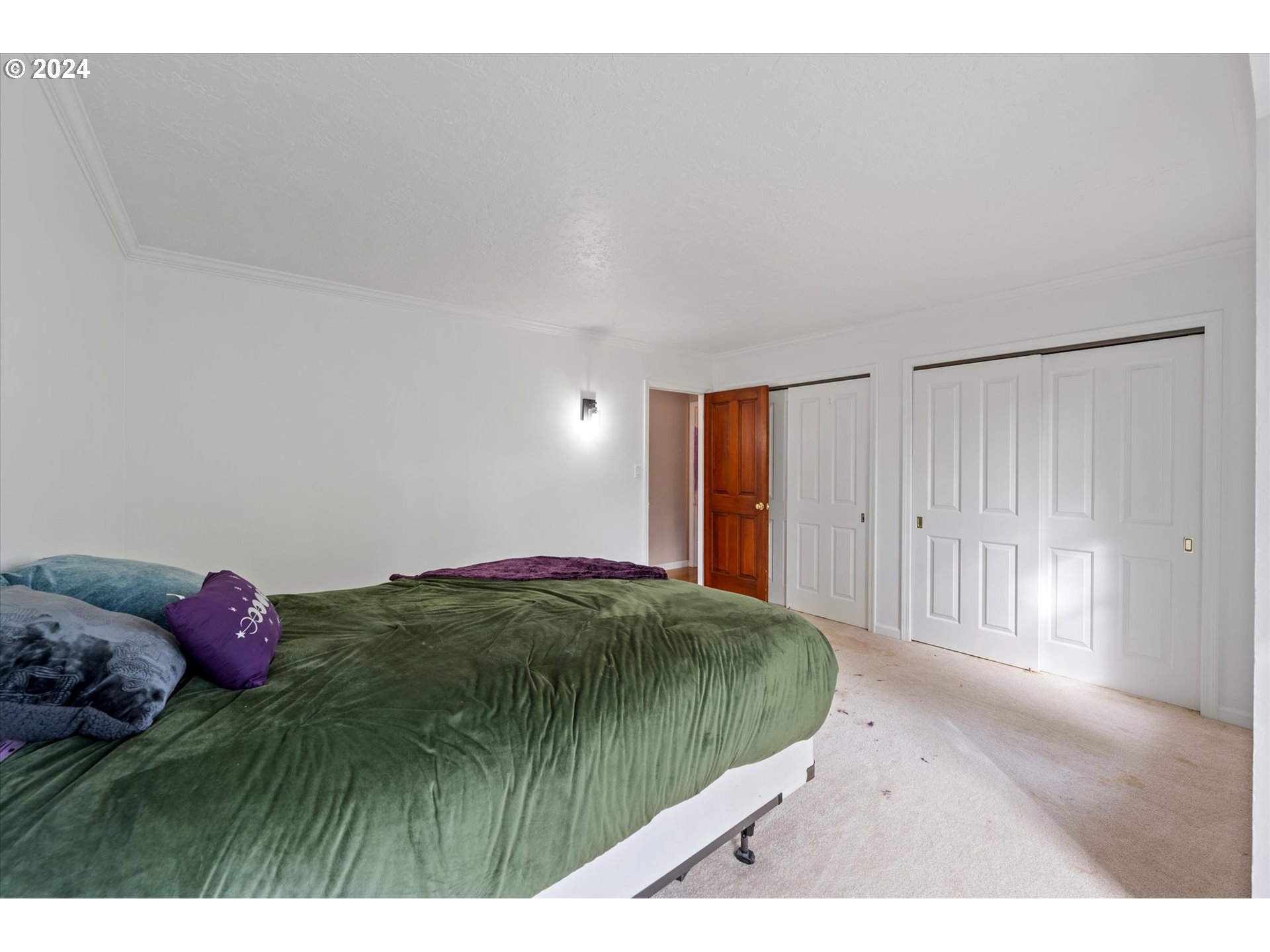 3516 Sunset Way Longview, WA 98632 - Photo 23 of 37 a bedroom with a bed and a window